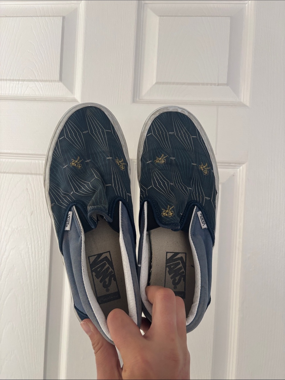Vans Slip-On Sneakers in Navy with Gold Accent